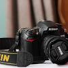 nikon d7000 with 18-105 VR lance and camera grip For Sale