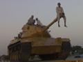 Afghan Playing with Tanks
