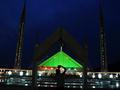 beautifully illuminated view of Faisal Mosque decorated with lights
