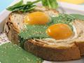 Fried Eggs With Spinach On Bread