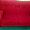 Red 2 seater sofa