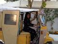 Pakistani Girl Driving an Auto Rickshaw